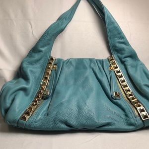 Blue leather purse 2 side zipper pockets magnetic closure new without tags